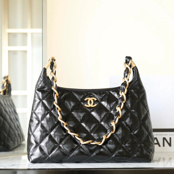 Pre-owned restored Chanel Chain Hobo Bag with black lambskin and chunky gold-tone chain, expertly restored by Empyrean Atelier