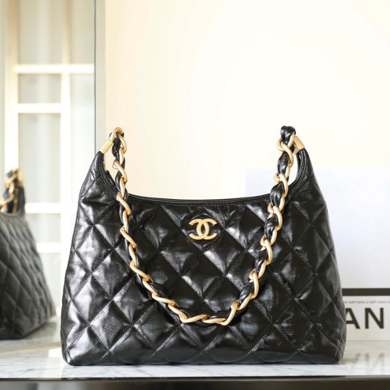 Pre-owned restored Chanel Chain Hobo Bag with black lambskin and chunky gold-tone chain, expertly restored by Empyrean Atelier