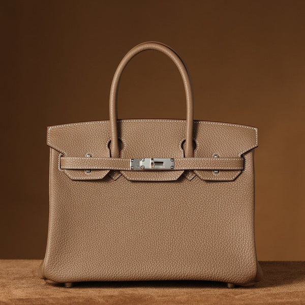 Pre-owned Hermès Birkin 30 in gold Togo leather with palladium hardware, restored by Empyrean Atelier