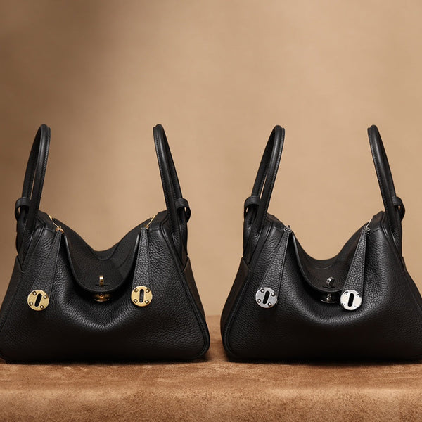Pre-owned restored Hermès Lindy 26 bags in black Clemence leather with gold and palladium hardware, restored by Empyrean Atelier
