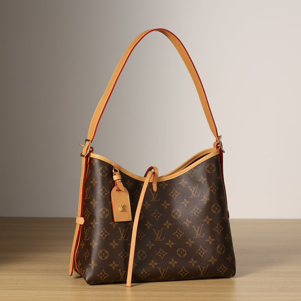 Pre-owned restored Louis Vuitton CarryAll shoulder bag in Monogram canvas with natural leather trim, revived by Empyrean Atelier